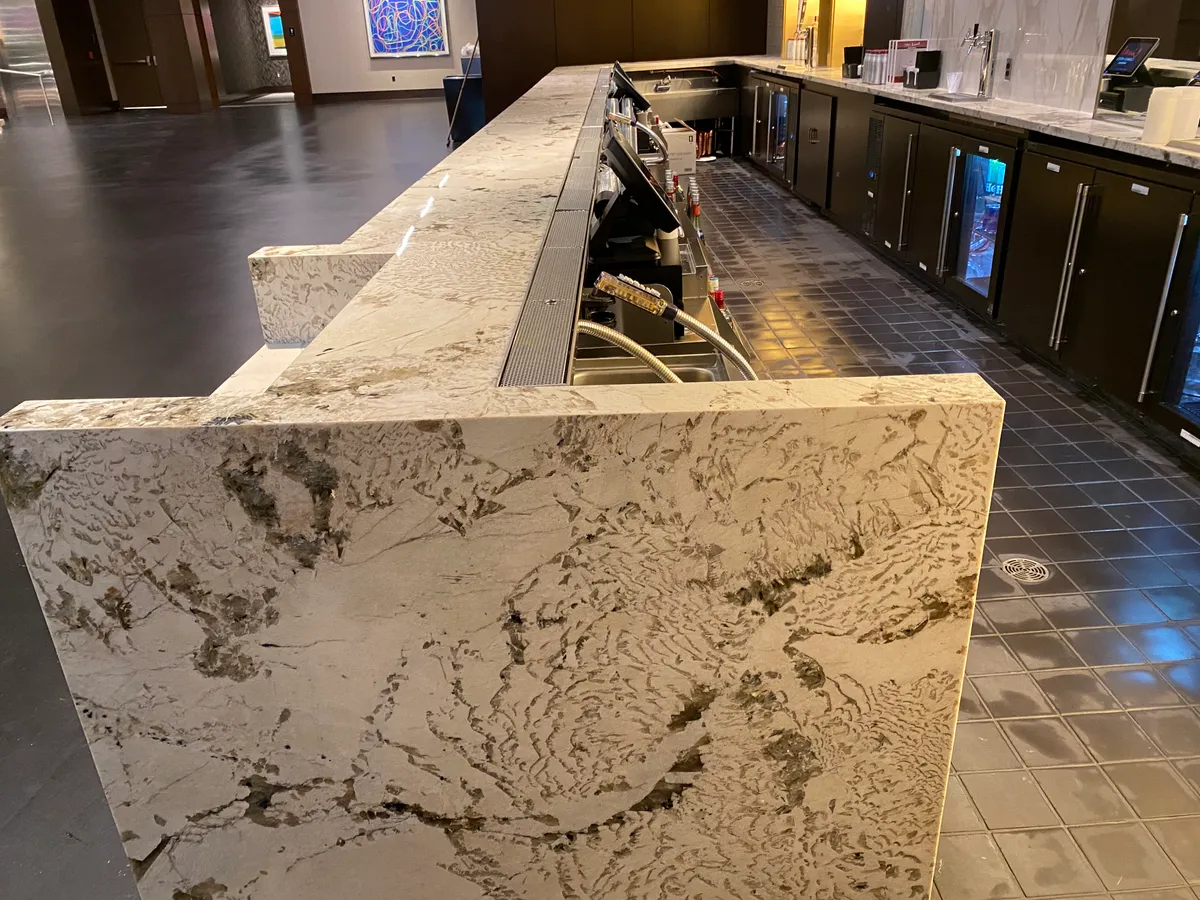 Stone vanity and finished surfaces in a commercial restroom